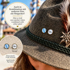 Bayern Pin „Zefix!“ kombiniert mit blau-weißem Bayern Pin an einem traditionellen Trachtenhut