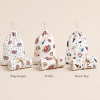 Drei Geschenk-Bundles Mulltücher in den Designs Regenbogen, Sealife und Beach Day