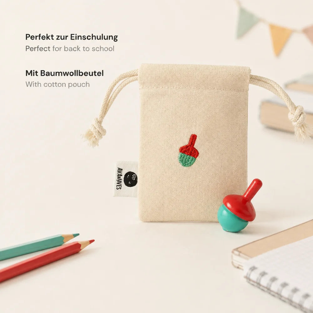 Holzkreisel mit Baumwollbeutel als kleines Geschenk zur Einschulung und für die Schultüte