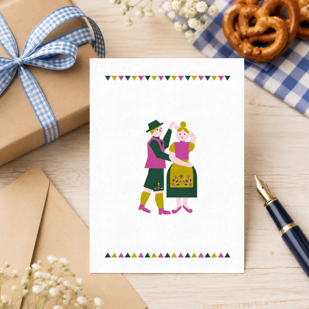 Oktoberfest-Postkarte A6 mit Geschenk, Brezen und blau-weißer Wiesn-Dekoration